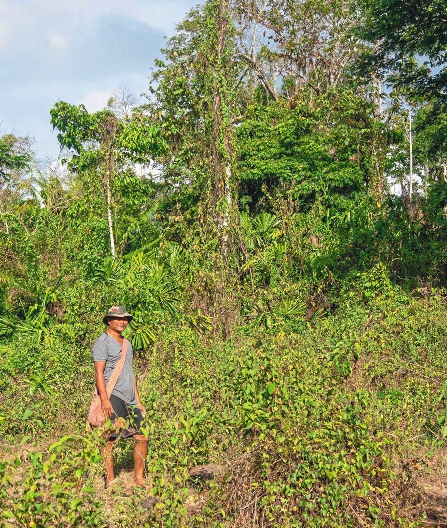 A_portrait_of_Saw_John_Aung_Thong,_a_prominent_environmentalist_and_Karen_community_leader,_in_the_forest_surrounding_We